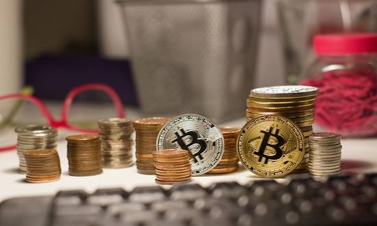 一年上涨350%，15000元一枚的比特币你敢买吗?