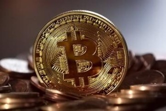 比特币诞生与早期发展历程及首个里程碑事件介绍